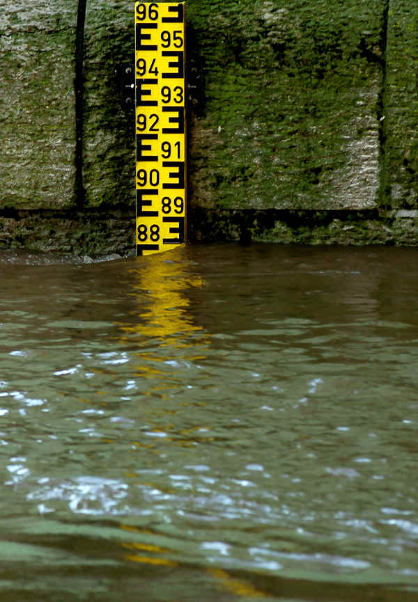 A water gauge displays floodwaters reaching 8m80 high in Cologne, although officials stated Tuesday that levels have been falling steadily by about one centimetre per hour.Photo: DPA
