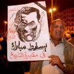 Merkel steps up pressure on Egypt’s Mubarak