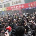 Journalists held in China over protest reports