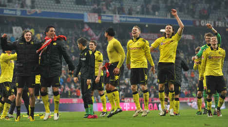 Dortmund heads for Bundesliga shield with victory over Munich