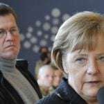 ‘Explain plagiarism,’ Merkel asks Guttenberg