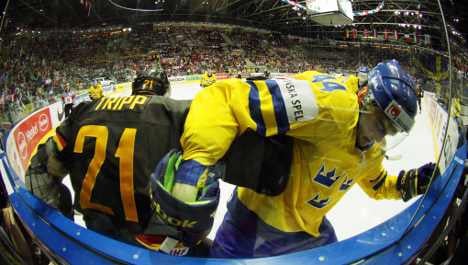 German ice hockey hopes melt in face of red-hot Swedes