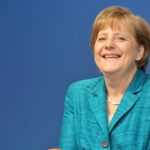 Merkel tells Germans to work harder too