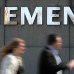 Siemens third quarter profits dip