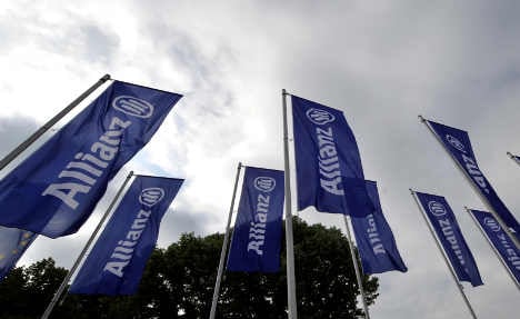 Insurer Allianz results bow to Greek losses