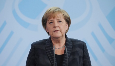Merkel talks euro rescue with France and Spain