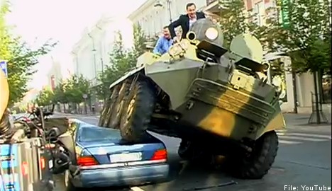 Vilnius mayor crushes car in wild tank ride for Swedish TV show