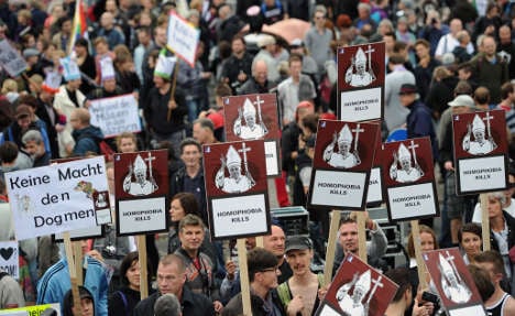 Protesters rally as pope speaks to parliament