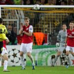 Borussia take point from Arsenal in return to Champions League