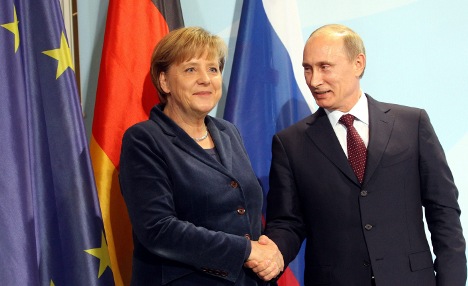 Merkel luke-warm on Putin's likely return