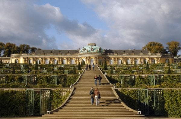 Sanssouci Palace, Brandenburg<br>A short S-Bahn ride outside of Berlin, the palace of Sanssouci ('no worries' in French) was built in Potsdam by Frederick the Great in the mid-1700s as an escape from his stressful city life. Situated on top of a terraced vineyard, the golden Rococo-style castle overlooks extensive parks and gardens, which cultivated wine, figs and plums. In 1990, the palace was named a UNESCO world heritage site.Photo: DPA