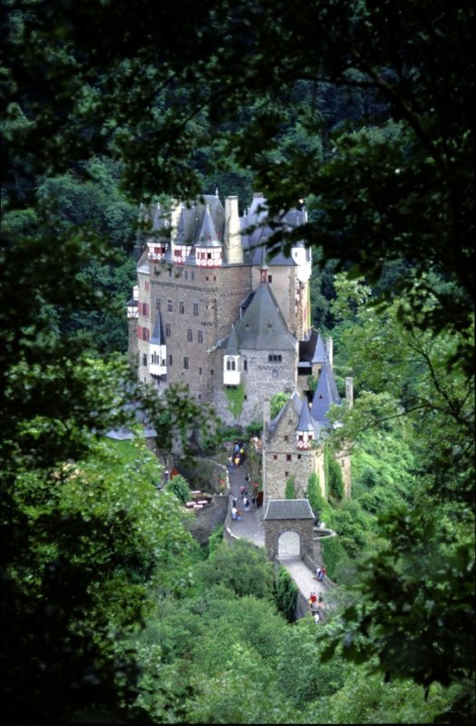 Castle of Eltz, Rhineland-Palitinate<br>The Castle of Eltz, a sturdy medieval fortress built in 1157, has never been destroyed. In the mid-1200s, the castle property was split among three lines of the Eltz heirs, whose descendants still own the castle today. Composed symmetrically with its surroundings, the fortress towers 70 metres (230 ft) above the Eltz River. Eltz Castle was featured on the German 500 Deutsche Mark note for almost 30 years (1965-1992).Photo: DPA
