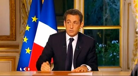 Sarkozy woos voters after euro deal