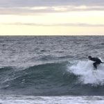 Swedish surfers defy cold to catch winter waves