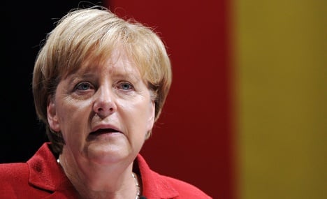 Merkel predicts bailout ratification