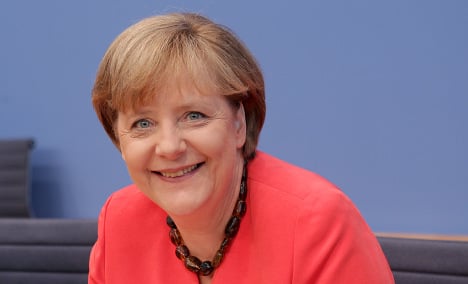 Merkel pleased by euro debt solution