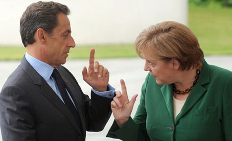 Merkel sees bigger Greek debt write down
