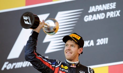 Vettel defends F1 crown