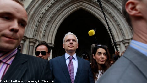 Assange cleared to continue extradition fight
