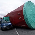 Truck drops 146-tonne crane on road