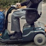 Legless man in surprise wheelchair reversal