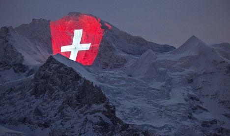 Iconic Swiss mountain lights up for first train ride