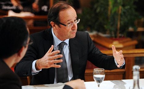 Hollande vows new spending and tax rises