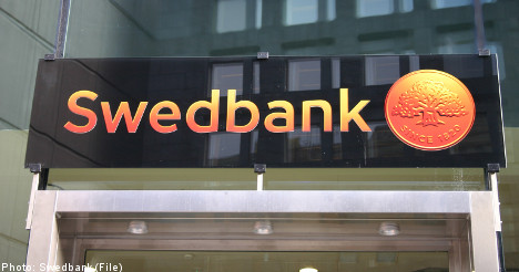 Swedbank in massive Latvia write down