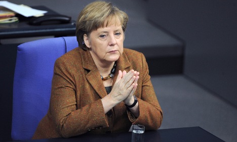 Merkel backs away from Greek budget control