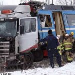 Stockholm train in violent crash with truck