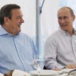 Schröder backs up old friend Putin