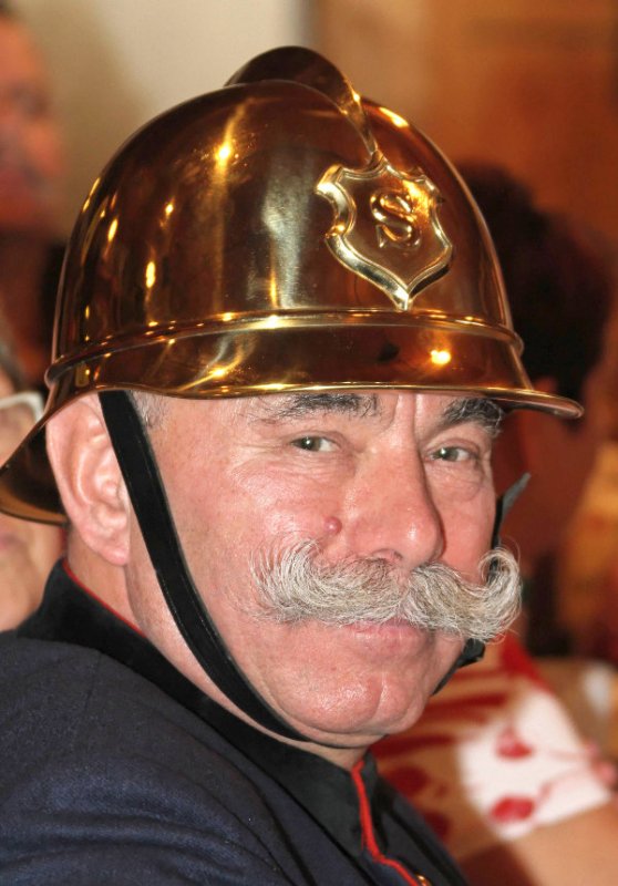 Egon Jörg - not only a fine moustache, a shiny helmet too.Photo: DPA