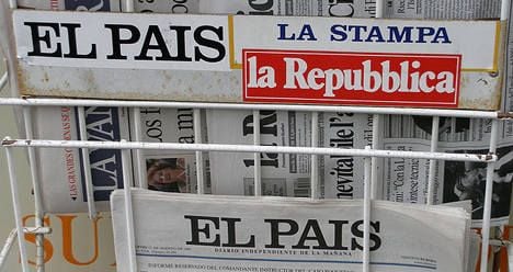Foreign press sees writing on the wall for Sarkozy