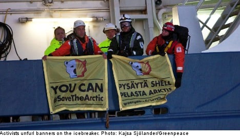 Greenpeace protesters occupy Arctic-bound ship