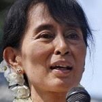 Hollande assures Suu Kyi of support