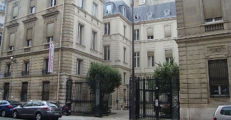 Man with fire extinguisher attacks Hollande HQ
