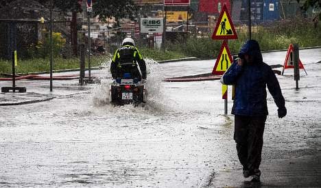 Oslo roads flooded in summer storm