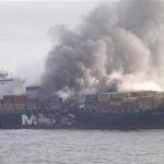 Burned cargo ship hunting for a port