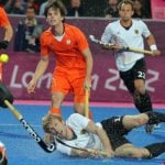 Germany fights hard to defend hockey gold