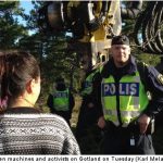 Police block activists at disputed mining site