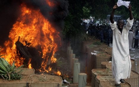 Germany condemns film as mob burns embassy