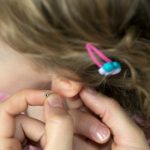 Judge questions legality of child ear-piercing