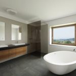 "The two modern luxury bathrooms with first-rate fittings allow for the house to be split into two apartments permitting its use by several parties or generations of the same family while providing the option of withdrawing to their private quarters."Photo: Nobilis Estate AG