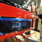 Top German truck maker suspends production