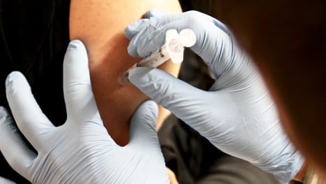 Switzerland lifts ban on Novartis flu vaccine