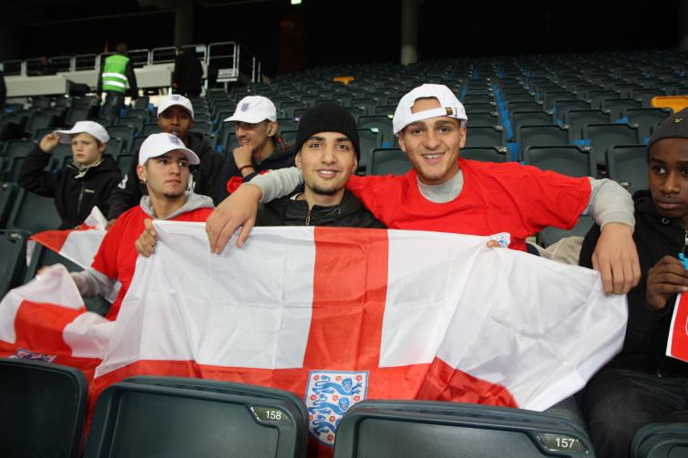 Young Swedish football fans meet English national team