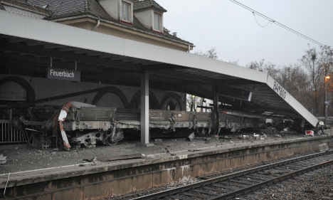Runaway train cars crash into Stuttgart station