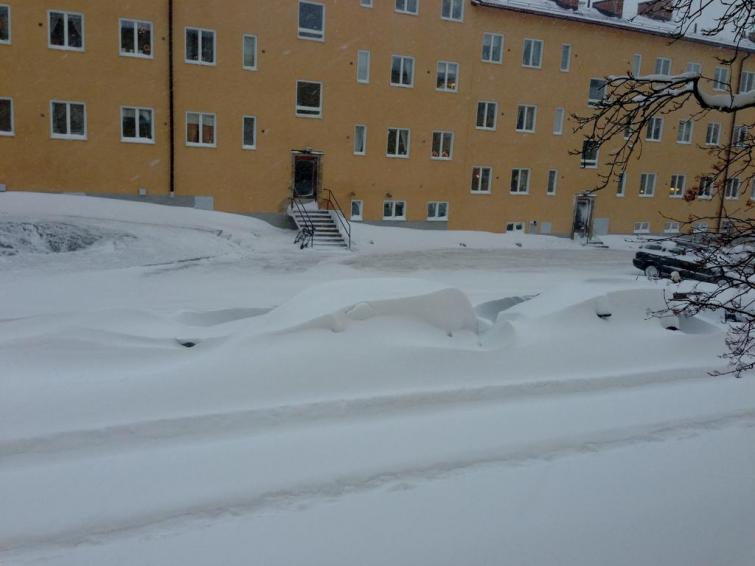 Can you see the two cars in the foreground?<br>Near Hägerstensåsen metro stationPhoto: Chin-Heng David Liu
