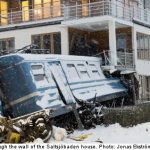 Cleaning lady steals train and crashes into house