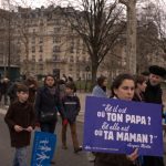 A protestor near the Eiffel Tower holds a sign reading "Where's your daddy? And where's your mommy?" - the catchphrase of French talkshow host Jacques Martin.Photo: Dan Mac Guill/The Local